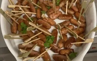 Sausages skewers in a bowl - All Events Hog Roast Sausages skewers in a bowl