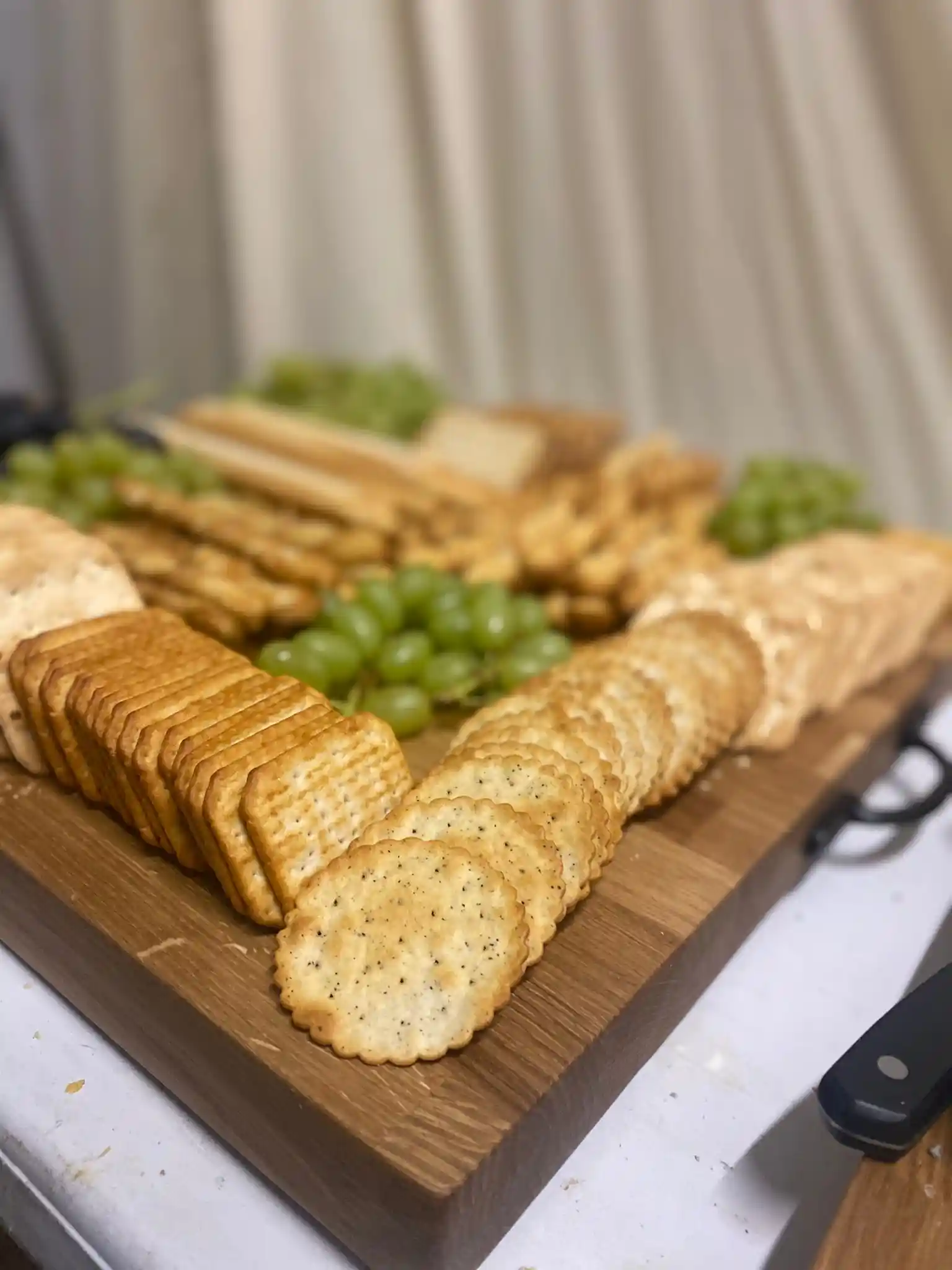 Cheese crackers, grapes, breadsticks