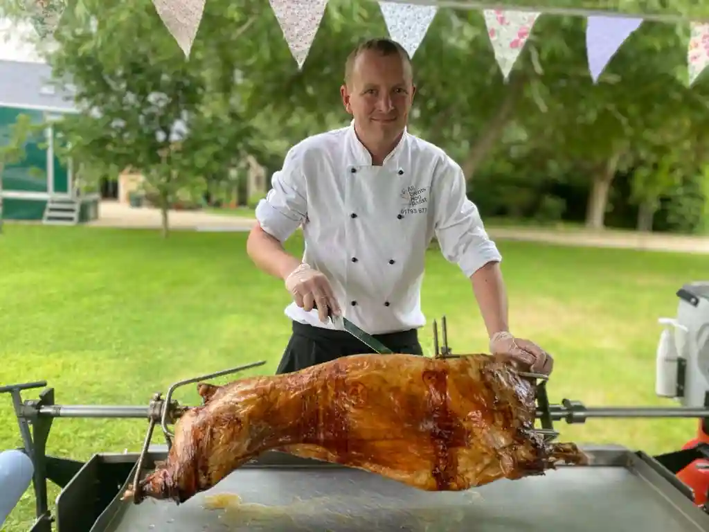 Hog pig roast catering - Mark about to cut into the spit roasted pig.